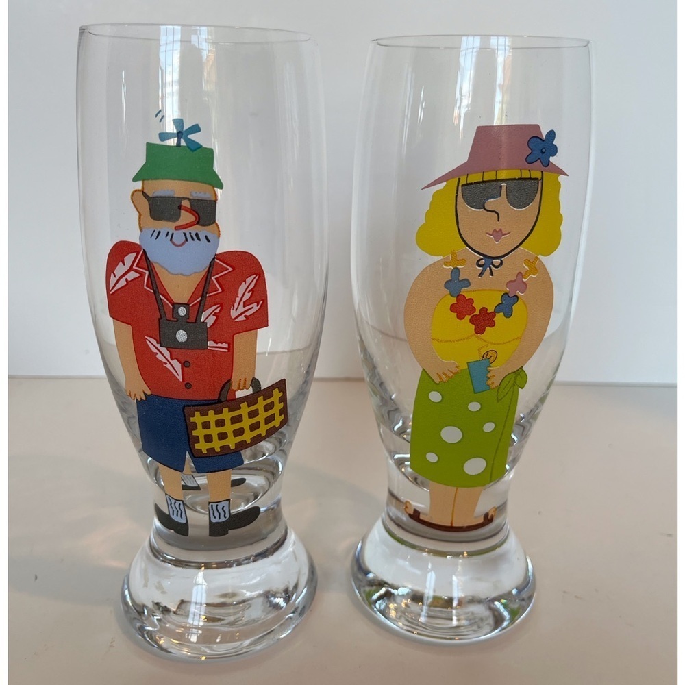 Pair of Glass Tumblers of Man and Woman on Vacation